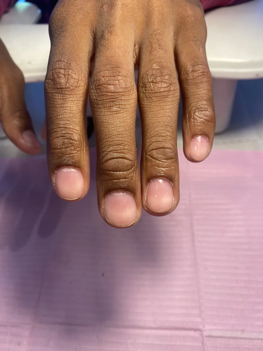 Clean, natural manicure — buffed and shaped