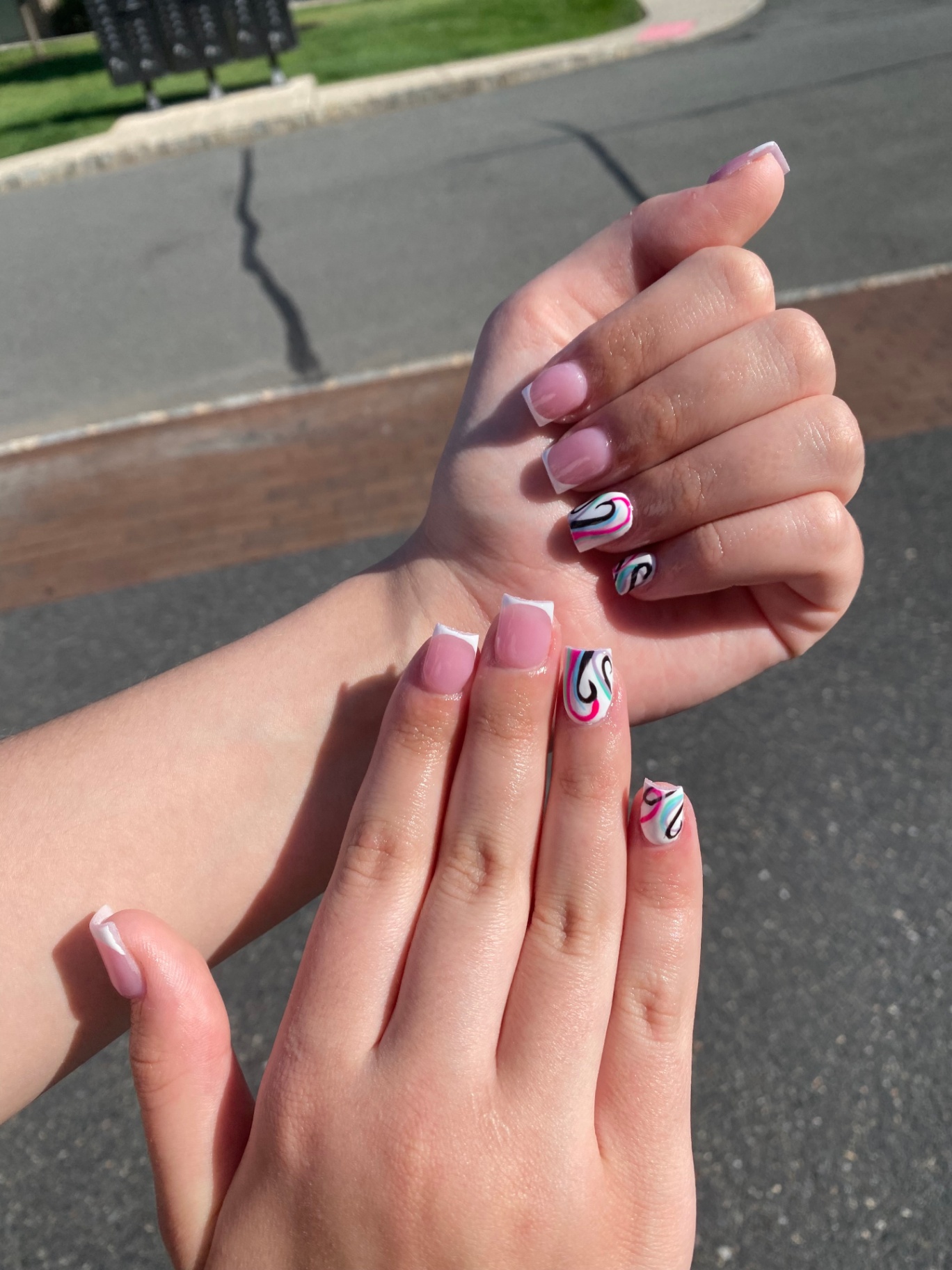 White French tips with swirl accent nail