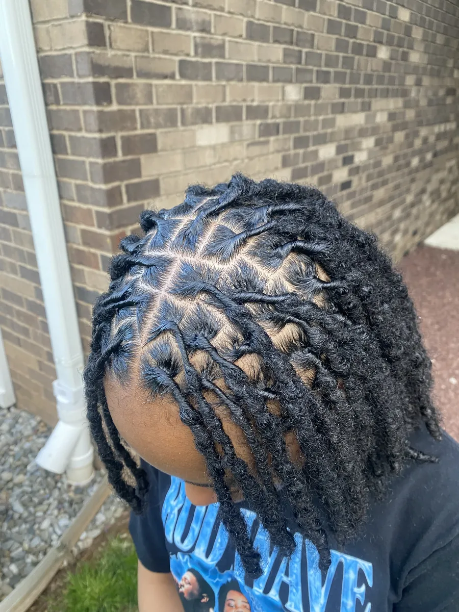 Sharp two-strand twists, outdoor portrait